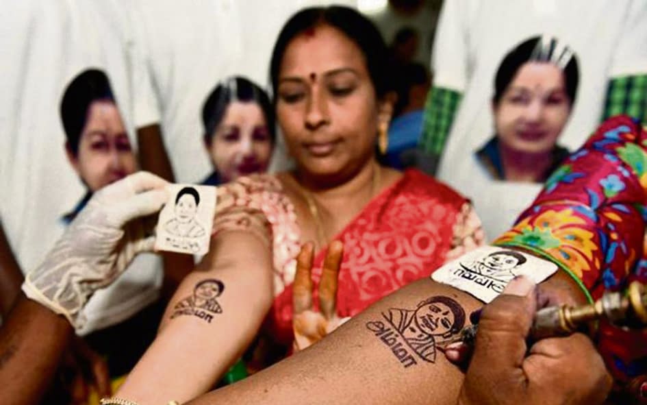 Over 1,000 tattoo Amma's image on their arms...