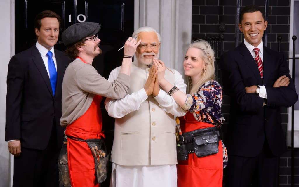 Indian Pm Narendra Modi Arrives In London Madame Tussauds Amitabh bachchan stands next to his wax statue at madame tussauds. indian pm narendra modi arrives in